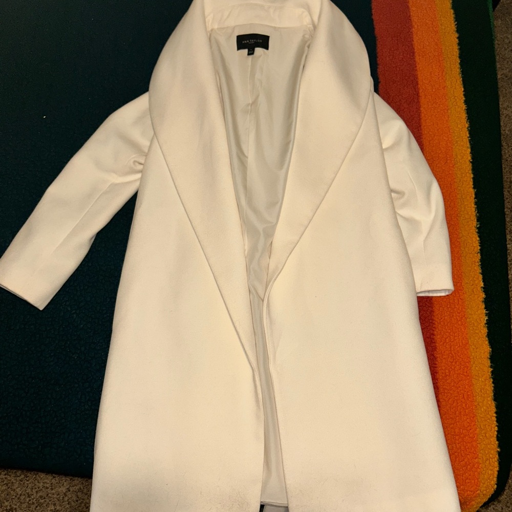Ivory Anne Taylor Long Coat side pockets and belt